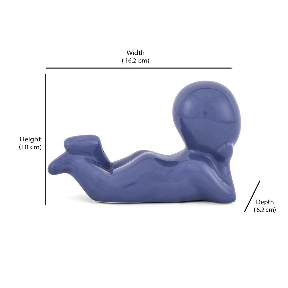 Boy Resting Polyresin Decorative Showpiece (Blue)