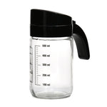 Transparent 660 ml Glass Oil Measure Jar With Lid (Transparent & Black)