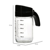 Transparent 660 ml Glass Oil Measure Jar With Lid (Transparent & Black)