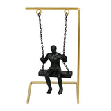 Man On Swing Decorative Polyresin Showpiece (Black & Gold)