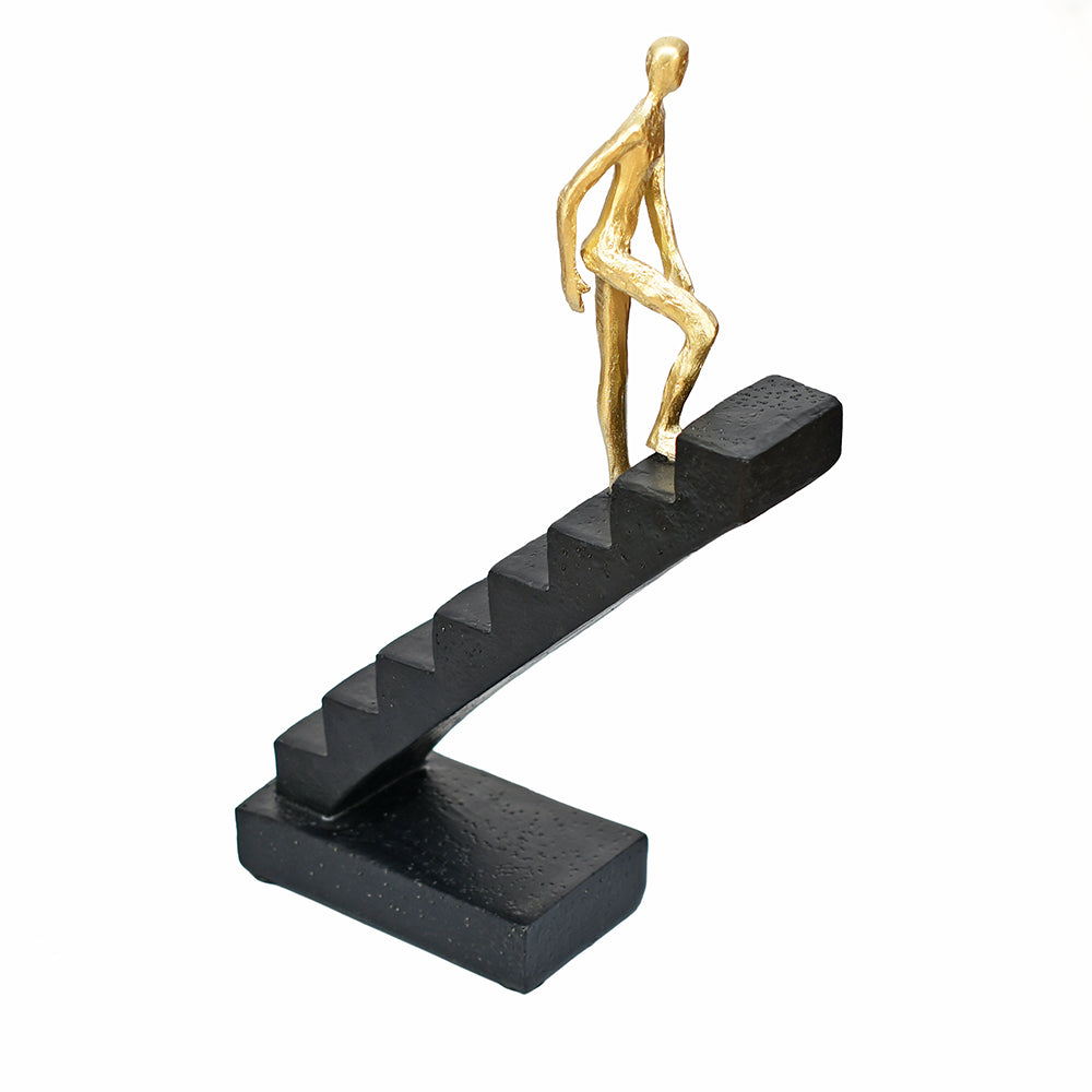 Man Climbing Stairs Decorative Polyresin Showpiece (Black & Gold)