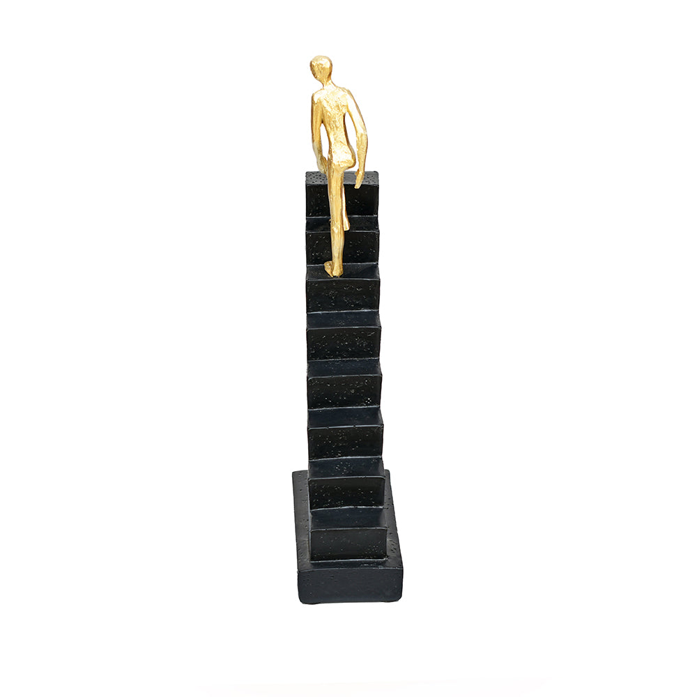 Man Climbing Stairs Decorative Polyresin Showpiece (Black & Gold)