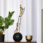 Two Men Climbing Decorative Polyresin Showpiece (Black & Gold)