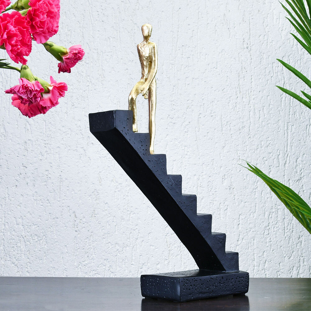 Nilkamal Man Climbing Ladder Decorative Polyresin Showpiece Black Gold