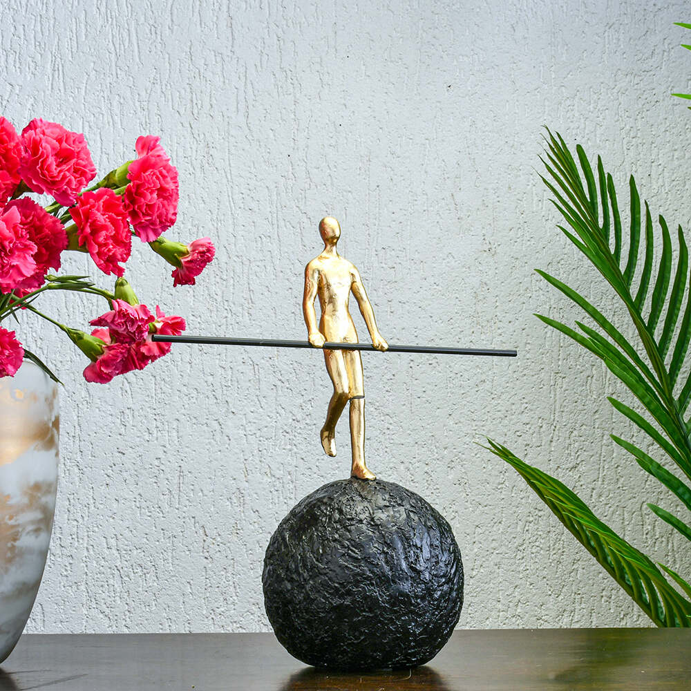 Nilkamal Balancing Man Decorative Polyresin Showpiece (Black & Gold)