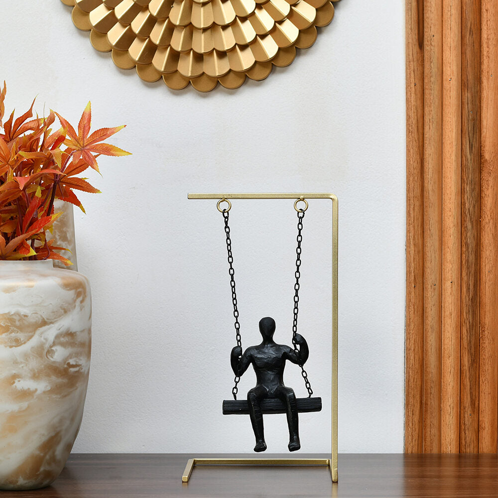 Man On Swing Decorative Polyresin Showpiece (Black & Gold)