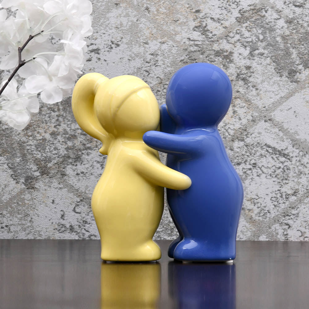 Two Children Hugging Polyresin Decorative Showpiece (Yellow & Blue)