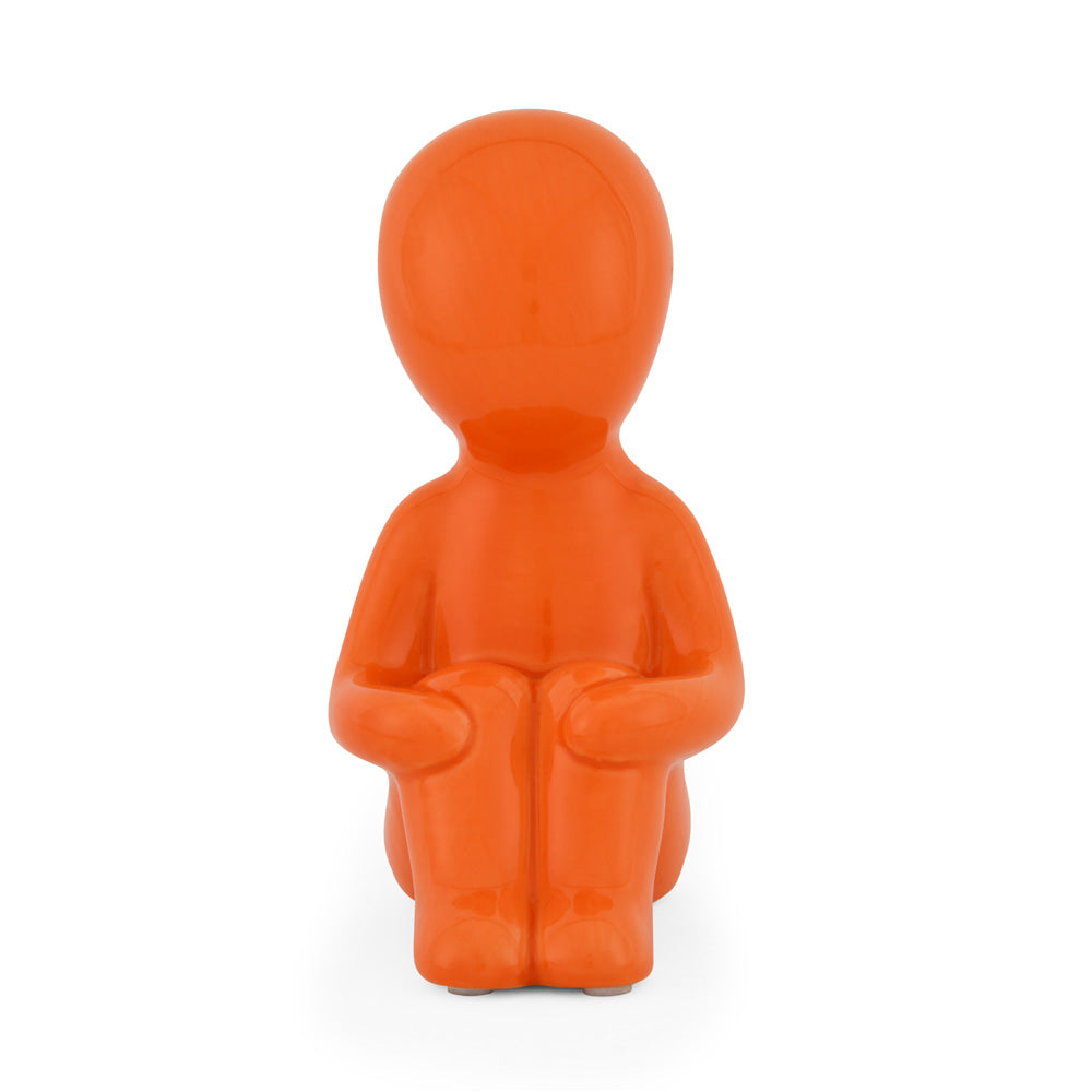 Boy Sitting with Folded Legs Polyresin Decorative Showpiece (Orange)