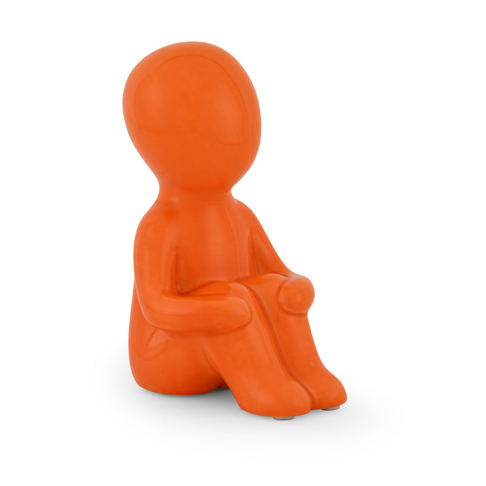 Boy Sitting with Folded Legs Polyresin Decorative Showpiece (Orange)