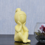 Girl Sitting with Hand On Chin Polyresin Decorative Showpiece (Yellow)