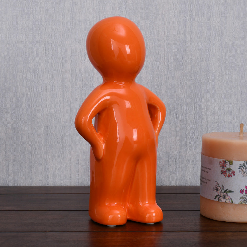 Standing Boy Polyresin Decorative Showpiece (Orange)