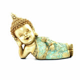 Baby Monk Lying Decorative Polyresin Showpiece (Mint & Gold)