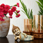 Baby Monk Lying Decorative Polyresin Showpiece (Mint & Gold)